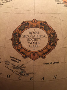 Sold at Auction: Royal geographical Society world globe on wooden